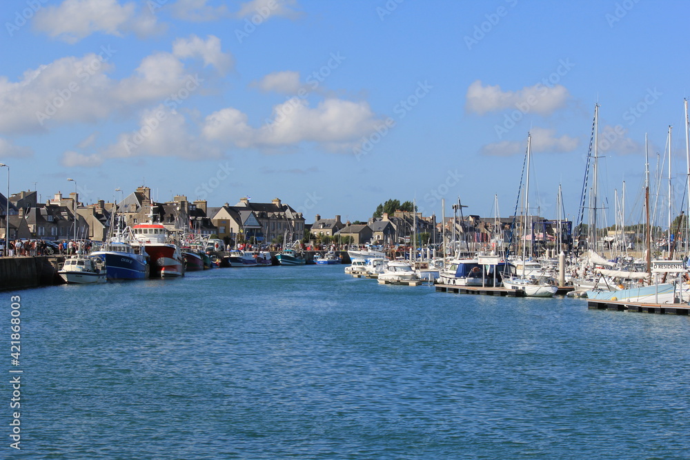 the beautiful harbor of saint-vaast-la-hougue at the french coast in normandy at a beautfiul day in summer