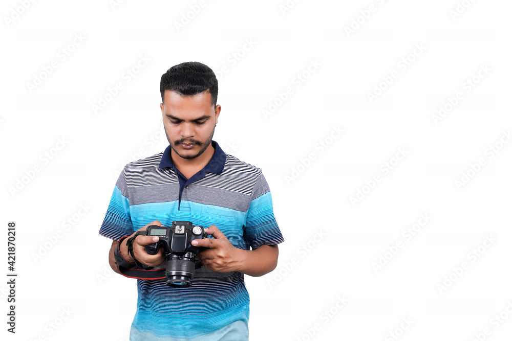 Young man capturing photos with a professional camera. Front view. Over white, all-angle view Young man capturing photos with a professional camera. Front view. Over white, all-angle view