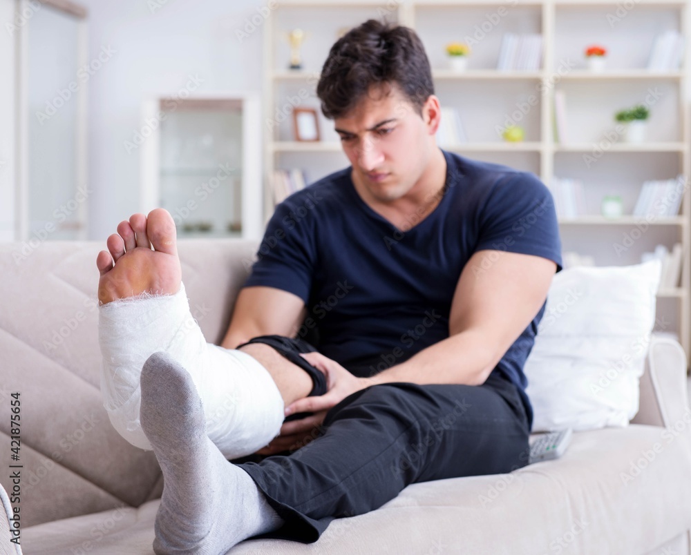 Man with broken leg recovering at home Man with broken leg recovering at home