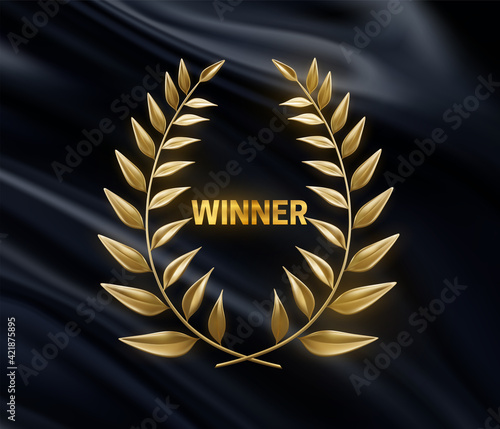 Winner sign with golden laurel wreath on drapery black fabric