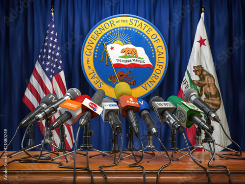 Press conference of governor of the state of California concept. Microphones TV and radio channels with symbol and flag of California state. photo