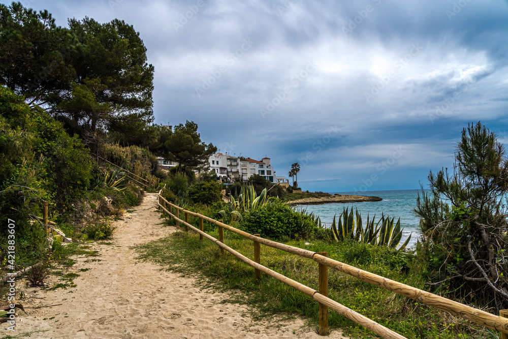 sandy road by the mediterranean sea