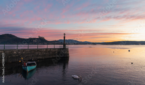 Tableau sur toile Alba ad Arona, Lago Maggiore - foschia e gabbiani