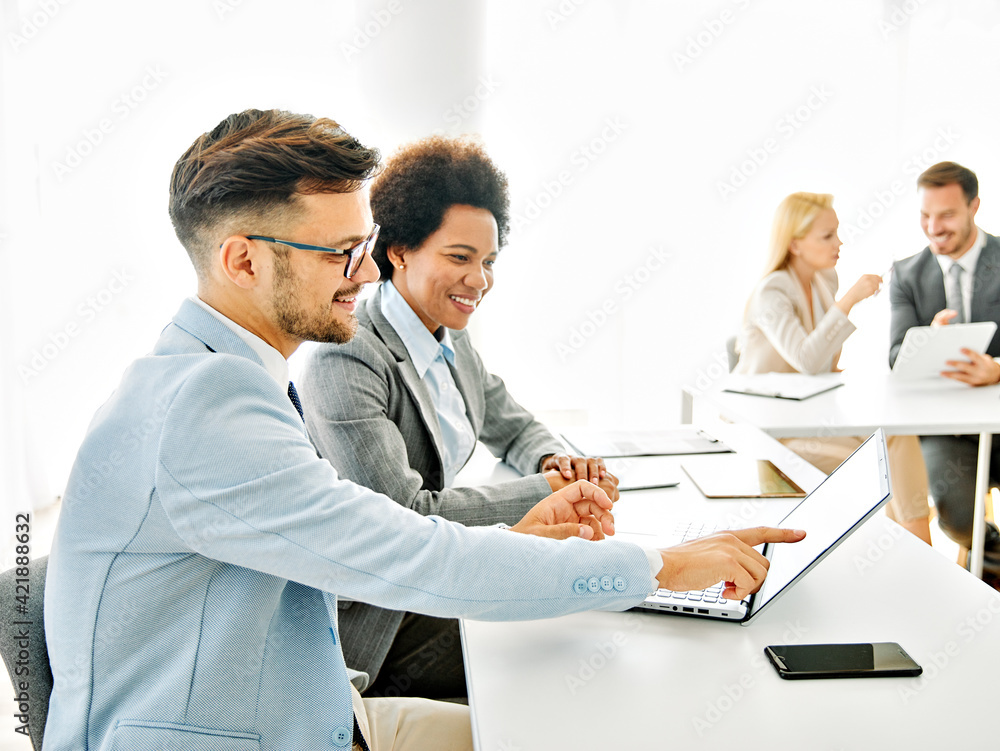 Fototapeta premium young business people meeting office teamwork black businesswoman corporate discussion laptop busniessman