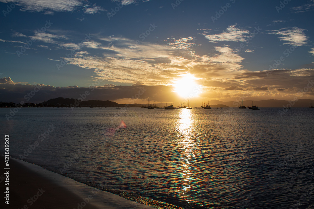 sunset over the sea located on the beach of Cachoeira do Bom Jesus, Canasvieras, Ponta das Canas, Florianópolis, Santa Catarina, Brazil sunset over the sea located on the beach of Cachoeira do Bom Jesus, Canasvieras, Ponta das Canas, Florianópolis, Santa Catarina, Brazil