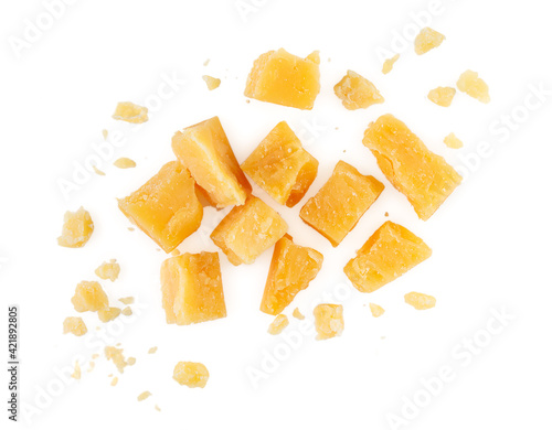 Heap of hard cheese parmesan isolated on a white background. Close up. Top view.