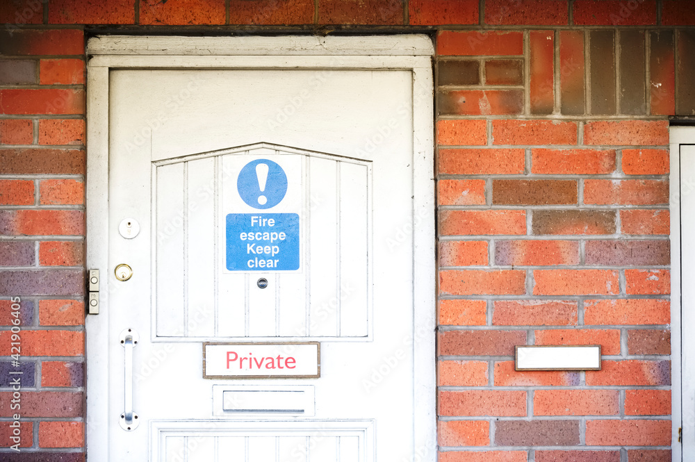 Building closed no entry sign on building door Building closed no entry sign on building door