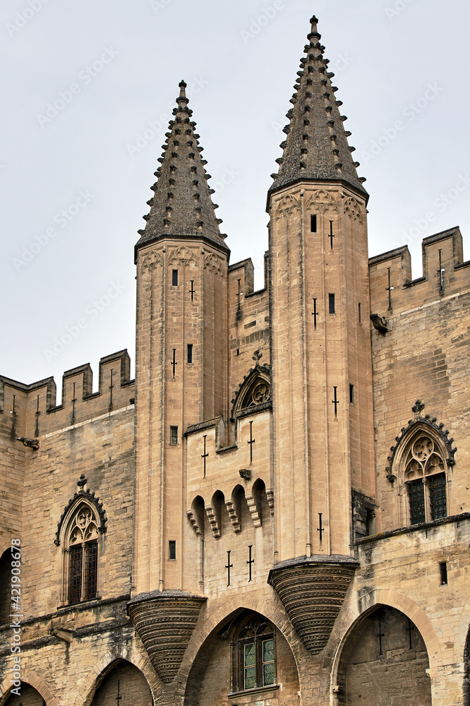 stone walls and towers of the medieval Castle of the Popes in the city of Avignon