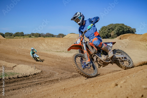 Fototapeta Naklejka Na Ścianę i Meble -  Motocross bike motorcycle track circuit jumps mud mx