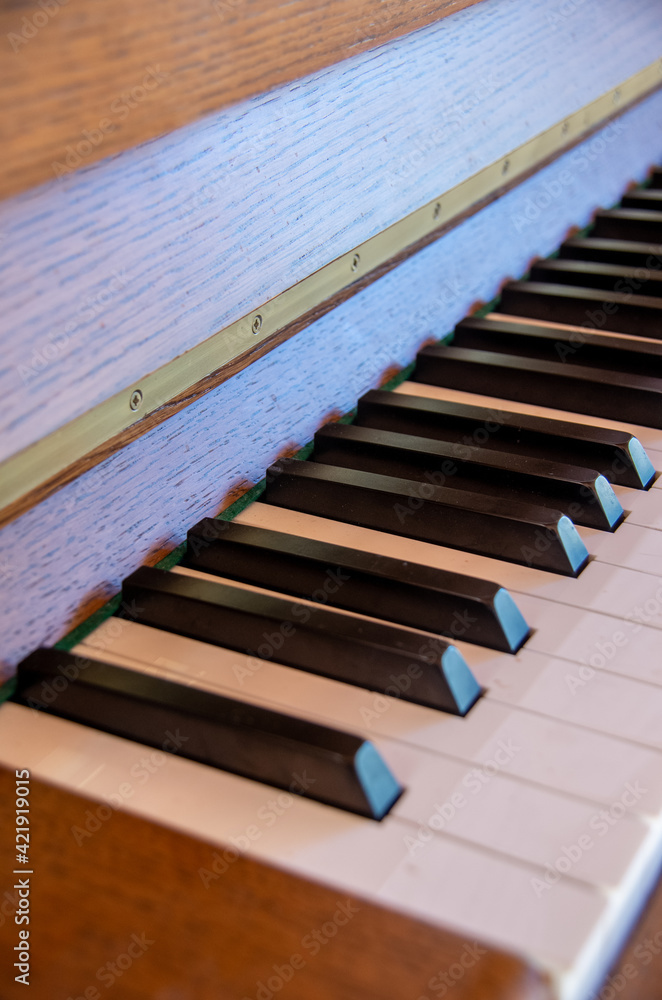 Keyboard of a piano in an interesting perspective Keyboard of a piano in an interesting perspective