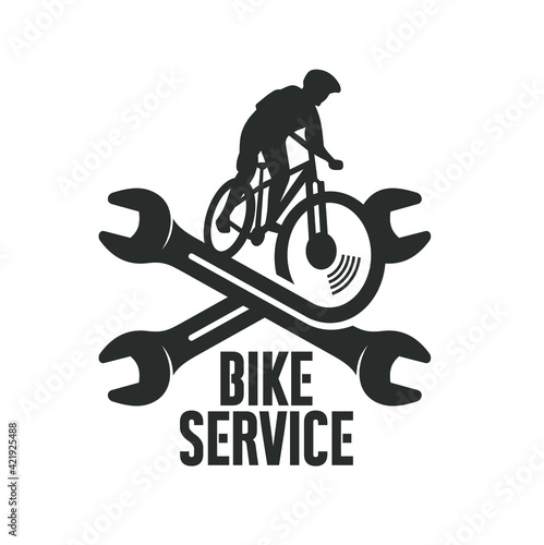 mountain bike and wrench, logo template for bicycle repair and maintenance services 