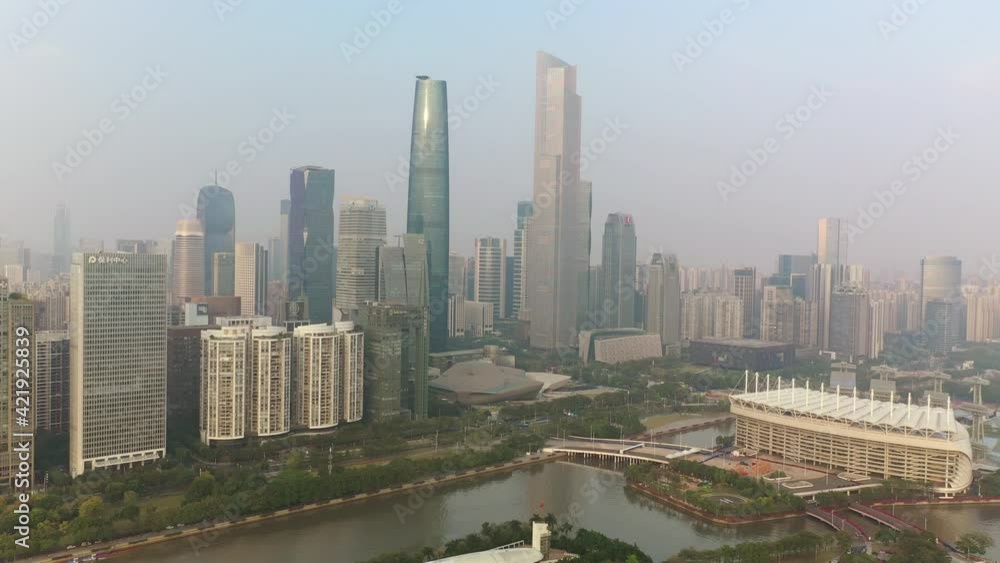 sunny evening guangzhou city downtown famous island stadium riverside aerial panorama 4k china sunny evening guangzhou city downtown famous island stadium riverside aerial panorama 4k china