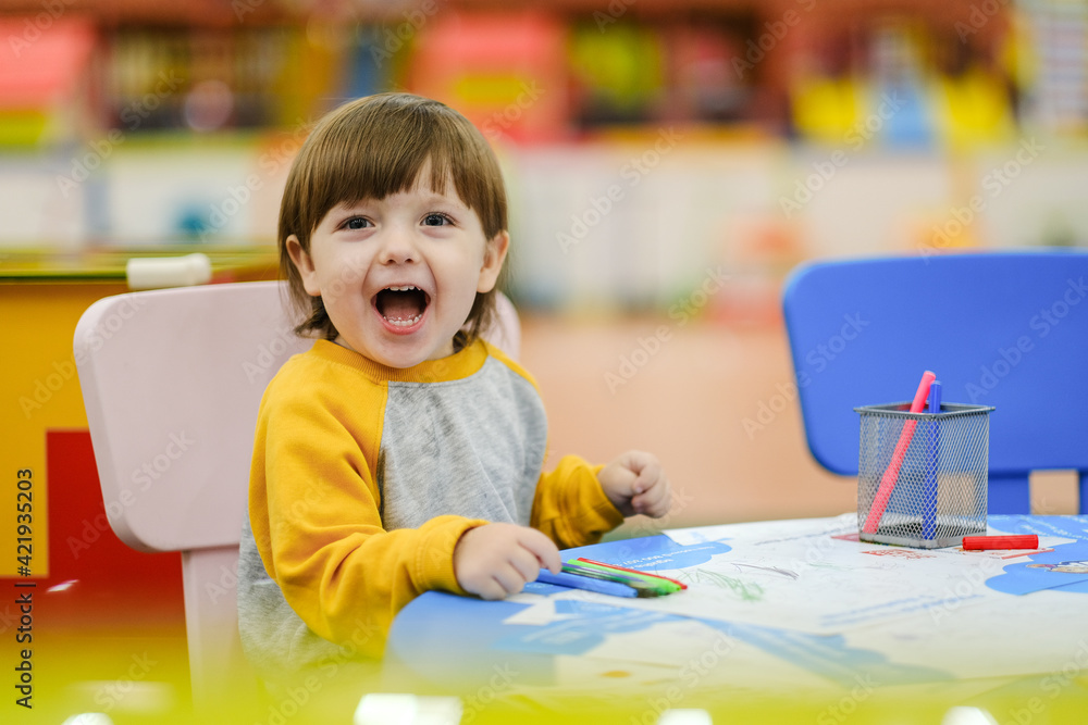 Creative baby development. Baby learns to draw. Early development of children in the Children's Development Center. Happy kid draws. Creative baby development. Baby learns to draw. Early development of children in the Children's Development Center. Happy kid draws.