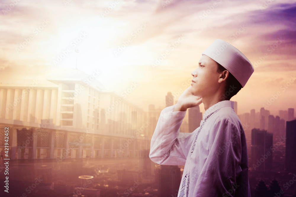 Fototapeta premium Double exposure of Muslim young man doing azan