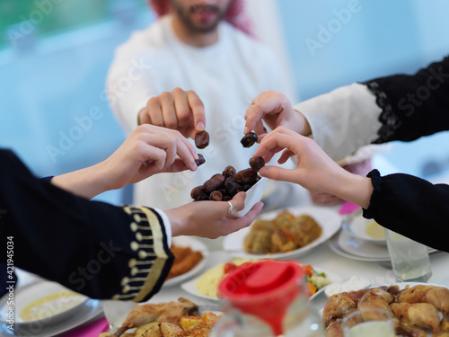 Muslim family having iftar together during Ramadan photo