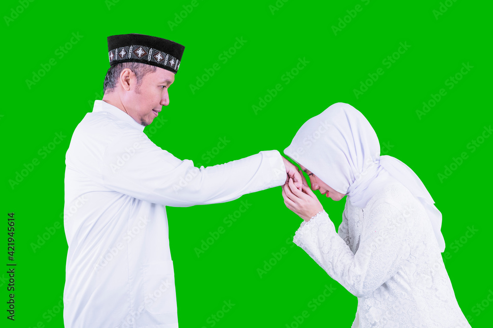 Muslim woman apologizing to her husband on studio Muslim woman apologizing to her husband on studio
