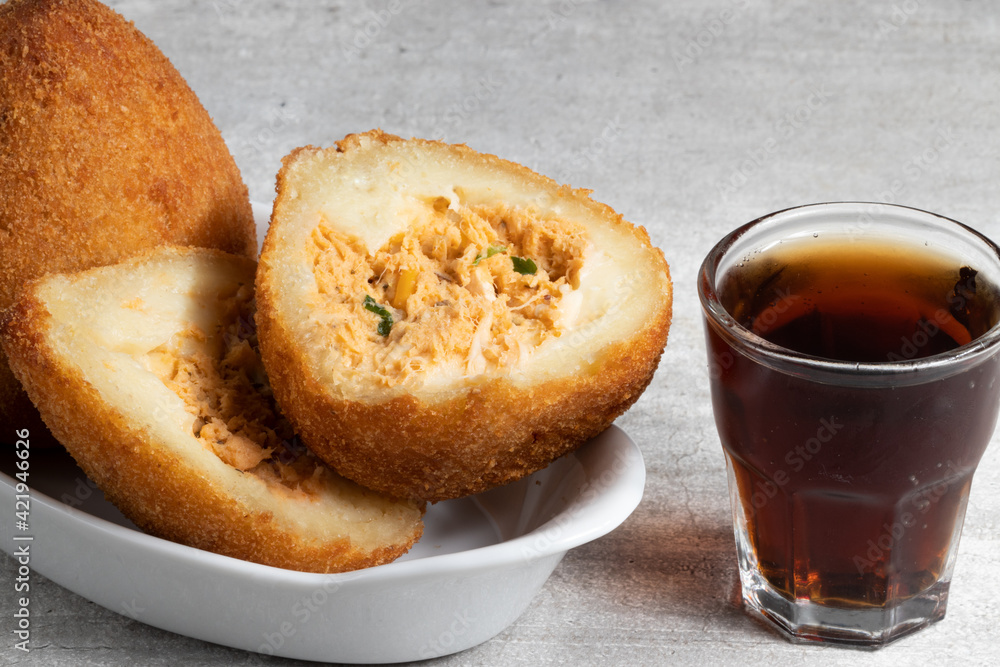 Delicious traditional Brazilian snack, coxinha of chicken. Delicious traditional Brazilian snack, coxinha of chicken.