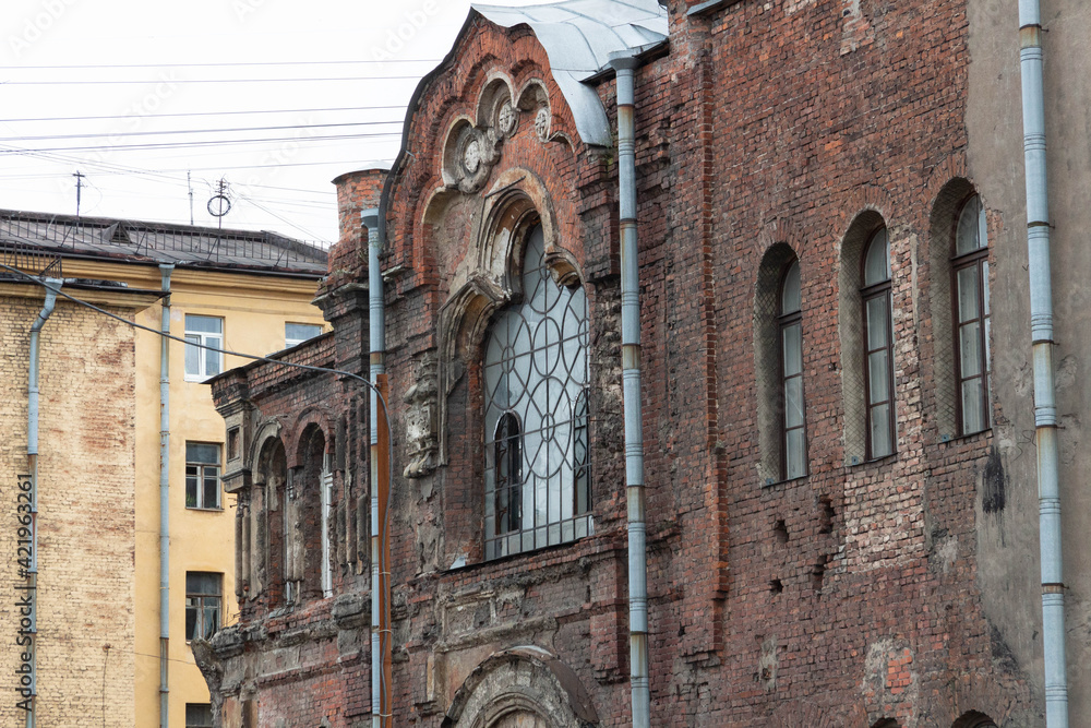 old brick red church building