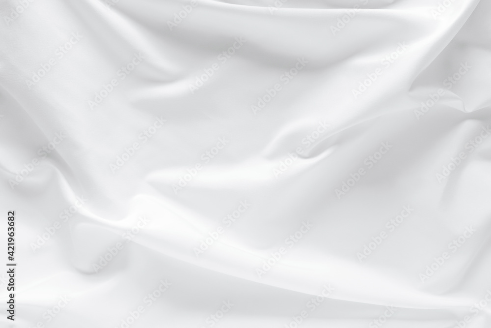 Naklejka premium Abstract white fabric texture background. Cloth soft wave. Creases of satin. silk and cotton. 