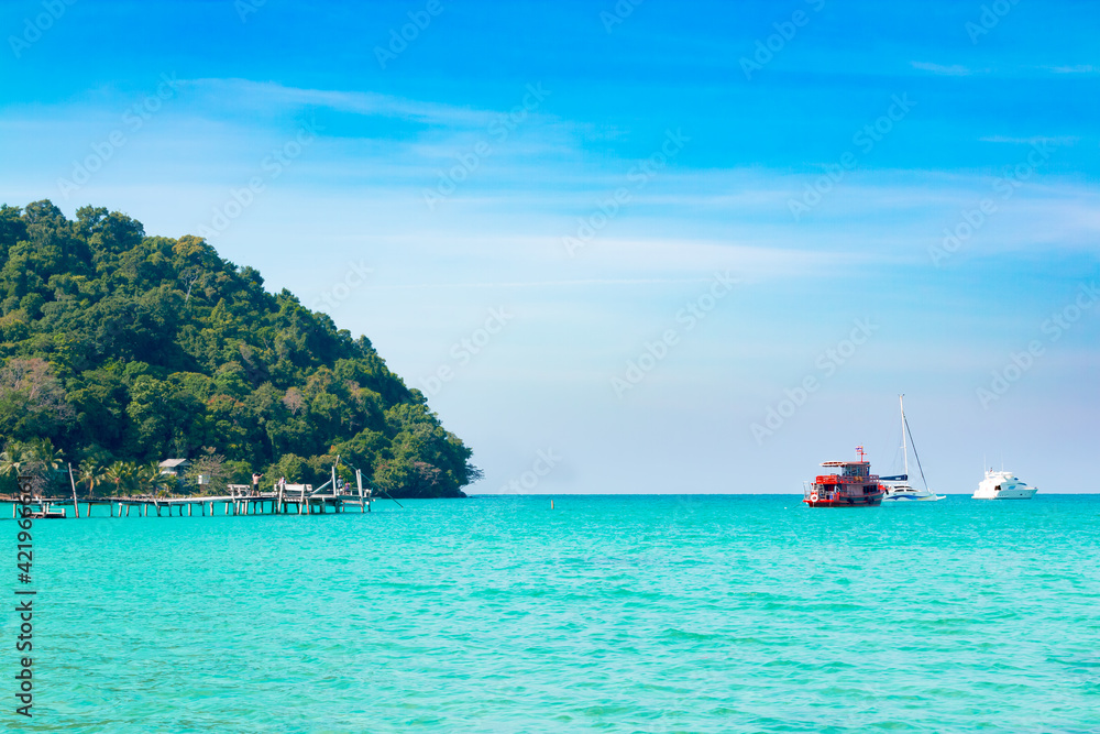 Koh Kood island is emerald green sea in the clear blue sky during the day time. Koh Kood island is emerald green sea in the clear blue sky during the day time.