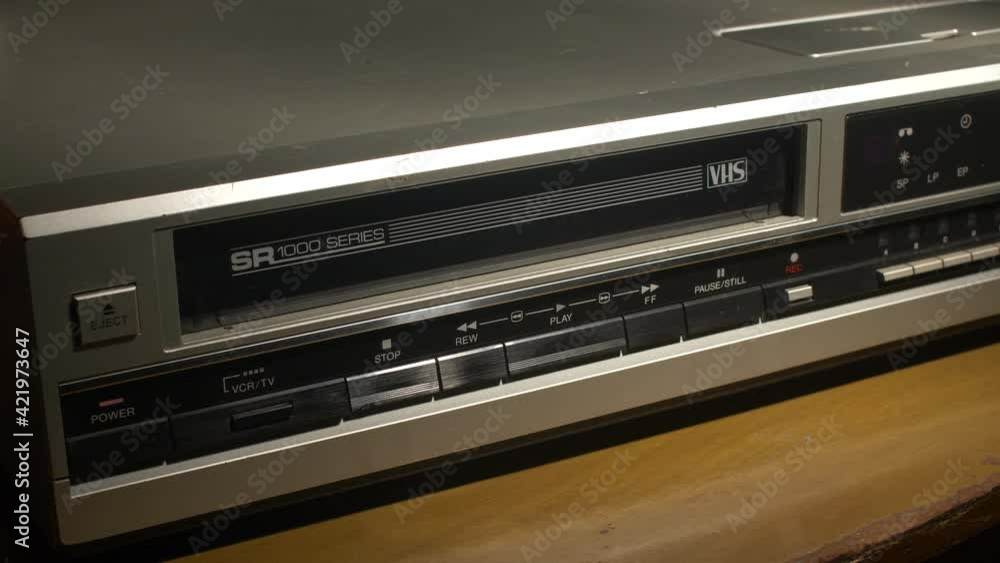 Pushing different function buttons on VCR Pushing different function buttons on VCR