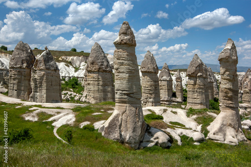 A series of volcanic rock formations known as fairy chimneys in Love Valley at Goreme in the Cappadocia region of Turkey.