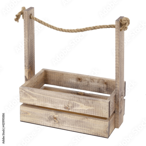 Wooden box with rope handle for flowers and gifts isolated
