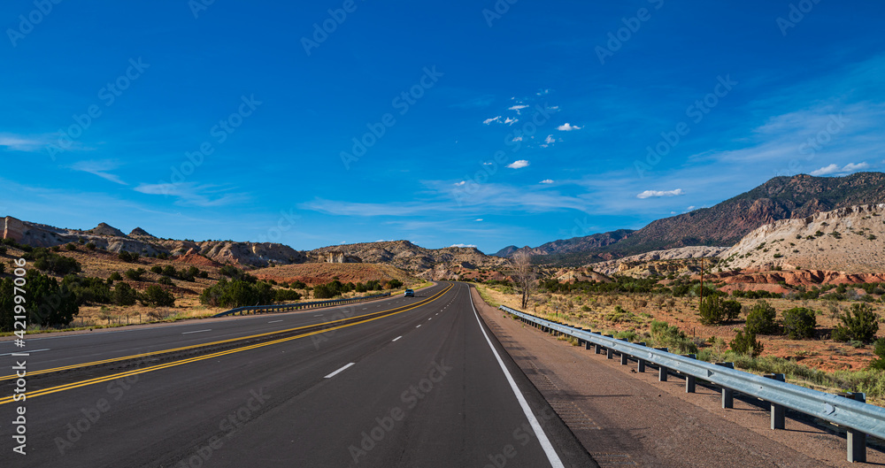 Empty highway asphalt road and beautiful sky landscape.