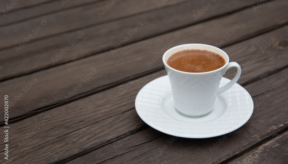 Turkish coffee on wooden table, front view Turkish coffee on wooden table, front view