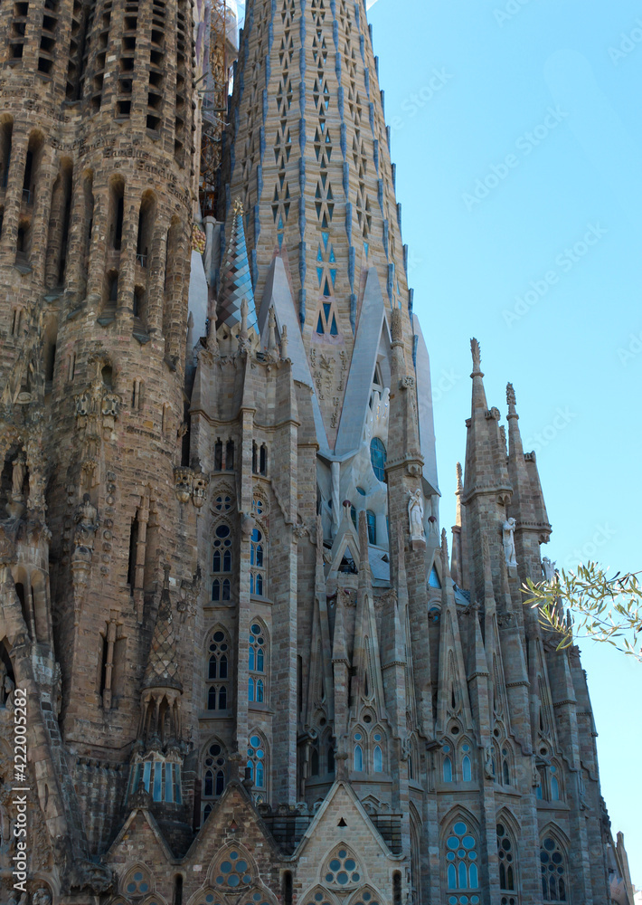 Facade of Sangrada Familia church, bottom view, on restoration, Barcelona - Spain.