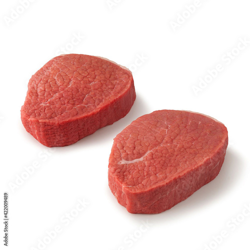 Close-up view of fresh raw Eye of Round Steak Round cut in isolated white background
