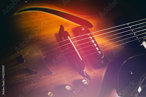 Old jazz electric guitar. Close-up. Background for music festivals, concerts. Musical education. Concert concept.