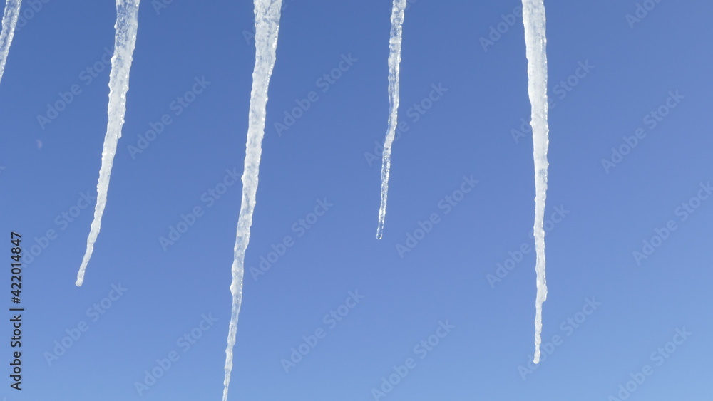 ice icicles hang from the roof ice icicles hang from the roof