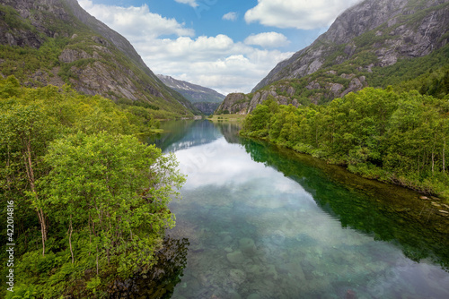 An idyllic green rural landscape scene from the mountains of Norway