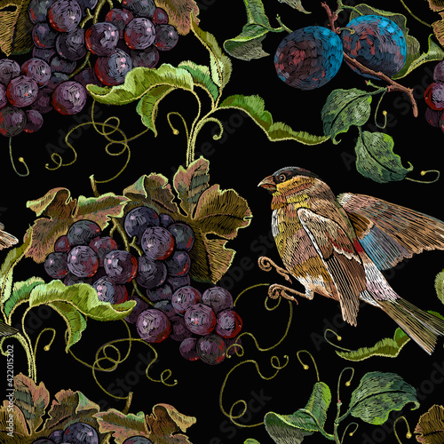 Embroidery cluster of grapes, plums and birds seamless pattern. Autumn harvest art. Template fashionable clothes, t-shirt design, print, renaissance style