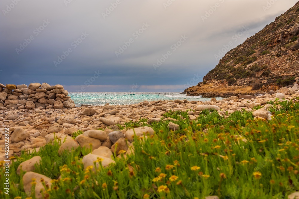 Stormy weather at the Rocky beach in Cala Pulcino, Lampedusa