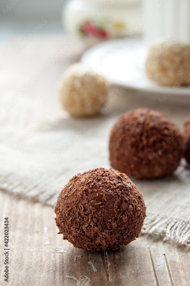 Homemade chocolate truffle with chocolate chips on the surface Homemade chocolate truffle with chocolate chips on the surface