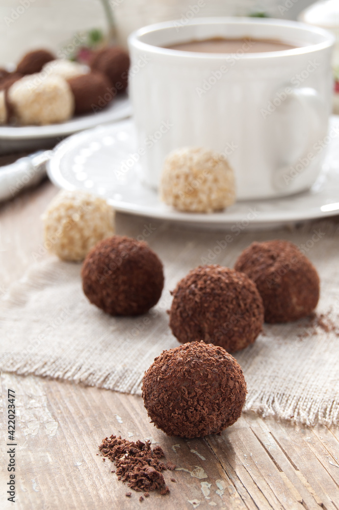 Homemade chocolate truffle with chocolate chips on the surface Homemade chocolate truffle with chocolate chips on the surface