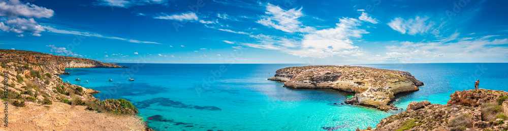 Panoramic view of The Rabbit beach in Lampedusa, Pelagie islands, a wild beach with crystal clear turquoise water
