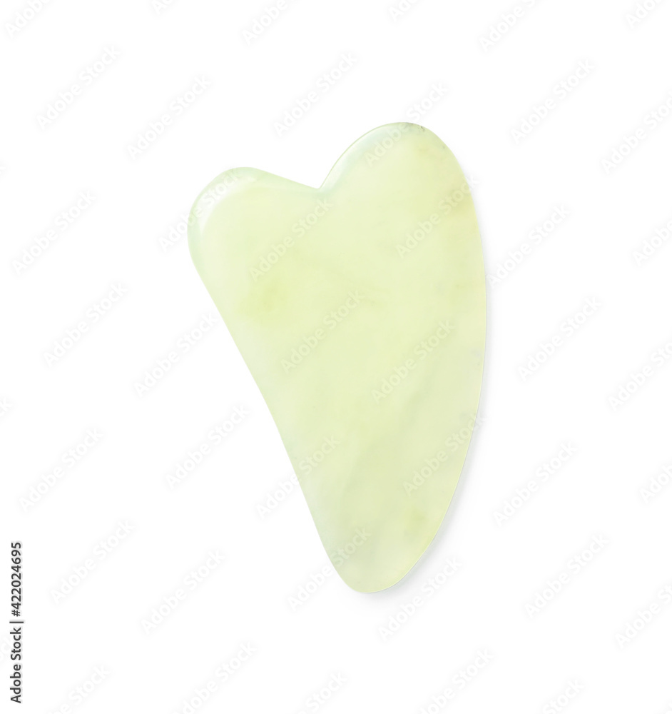 Fototapeta premium Jade gua sha tool on white background, top view