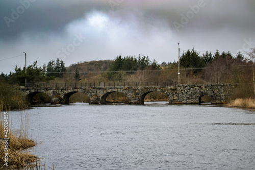 Stone bridge over river