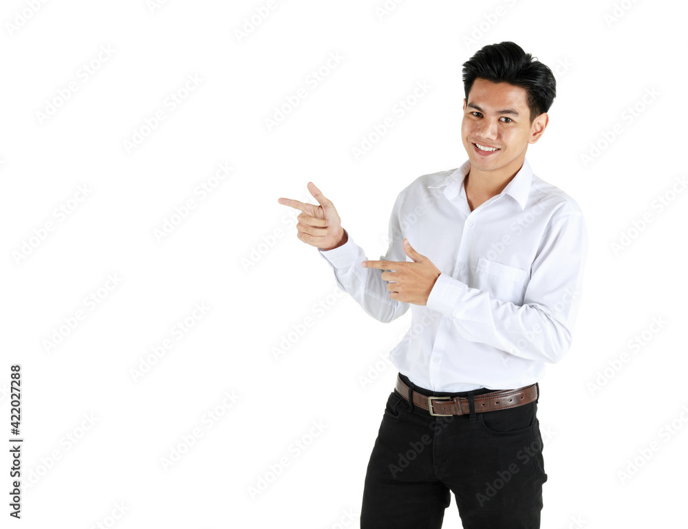 Portrait studio shot of a young friendly face and handsome Asian man standing and pose to camera with positive gesture isolated on white background and pointing finger to copy space on side of him. Portrait studio shot of a young friendly face and handsome Asian man standing and pose to camera with positive gesture isolated on white background and pointing finger to copy space on side of him.