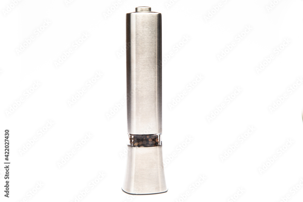 metal spice grinder on a white background metal spice grinder on a white background