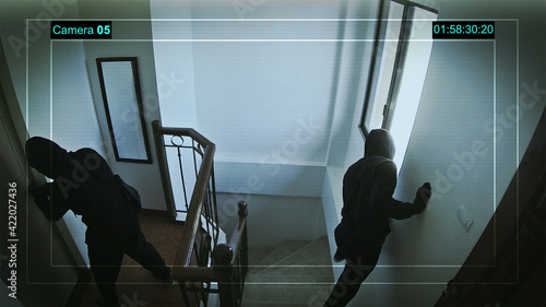 Photography Unknown male robbers entered the house, CCTV recording.