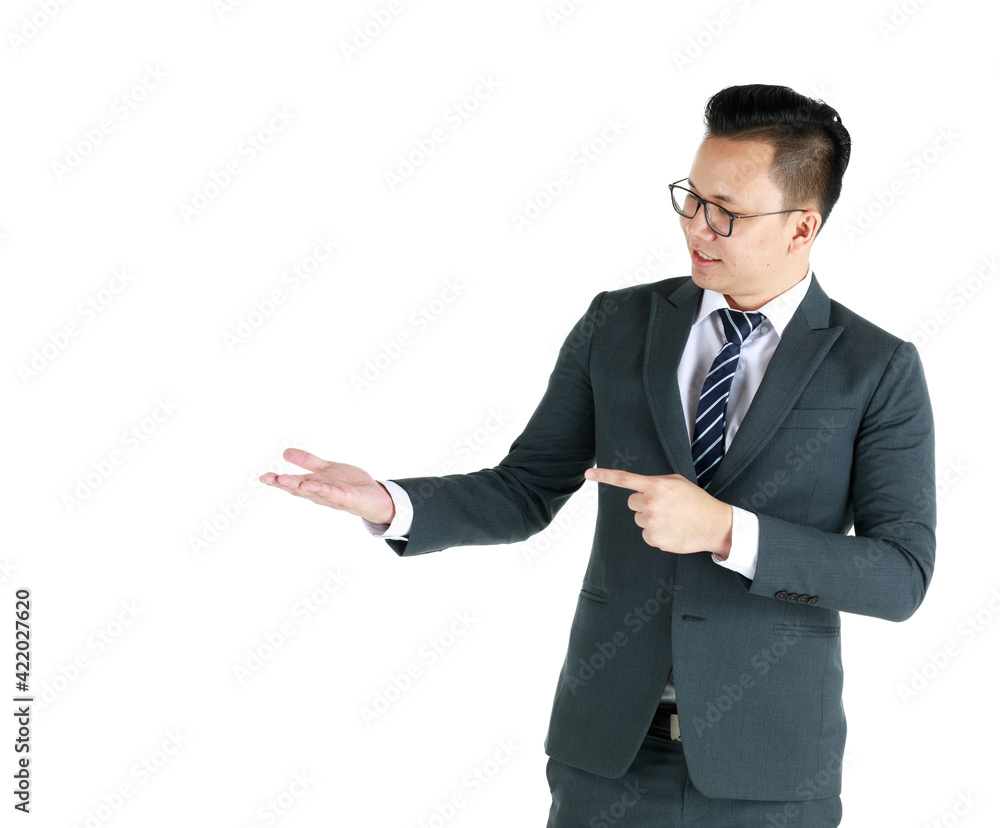 Young and handsome businessman executive look, wearing dark gray suit and eyeglasses standing with friendly face and self-confidence and pose hand in advertising and presenting something Young and handsome businessman executive look, wearing dark gray suit and eyeglasses standing with friendly face and self-confidence and pose hand in advertising and presenting something