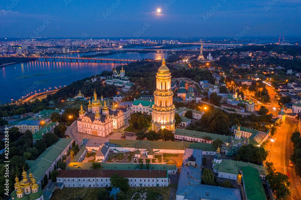 Beautiful summer top view of the Kiev-Pechersk Lavra. Many churches. Beautiful panorama of Kiev in the evening.