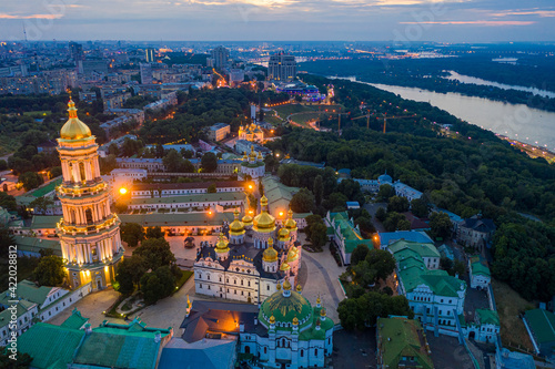 Beautiful summer top view of the Kiev-Pechersk Lavra. Many churches. Beautiful panorama of Kiev in the evening.