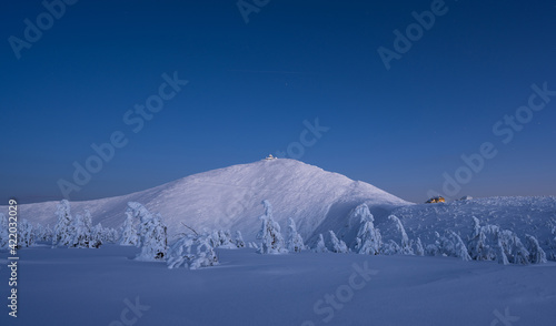 Obraz na płótnie amazing view of Sniezka peak at dusk in winter in the Karkonosze Mountains in Poland w salonie