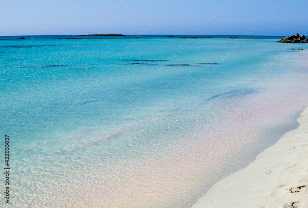 Elafonisi pink beach with crystal clear waters, Mediterranean Sea. Crete island, Greece