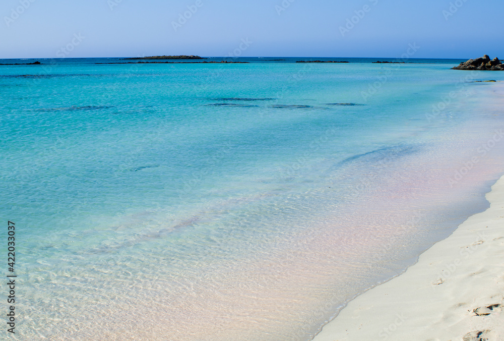 Fototapeta premium Elafonisi pink beach with crystal clear waters, Mediterranean Sea. Crete island, Greece